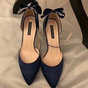 Sapphire blue dress shoes. 3” high. Size 7. Bow in the back
